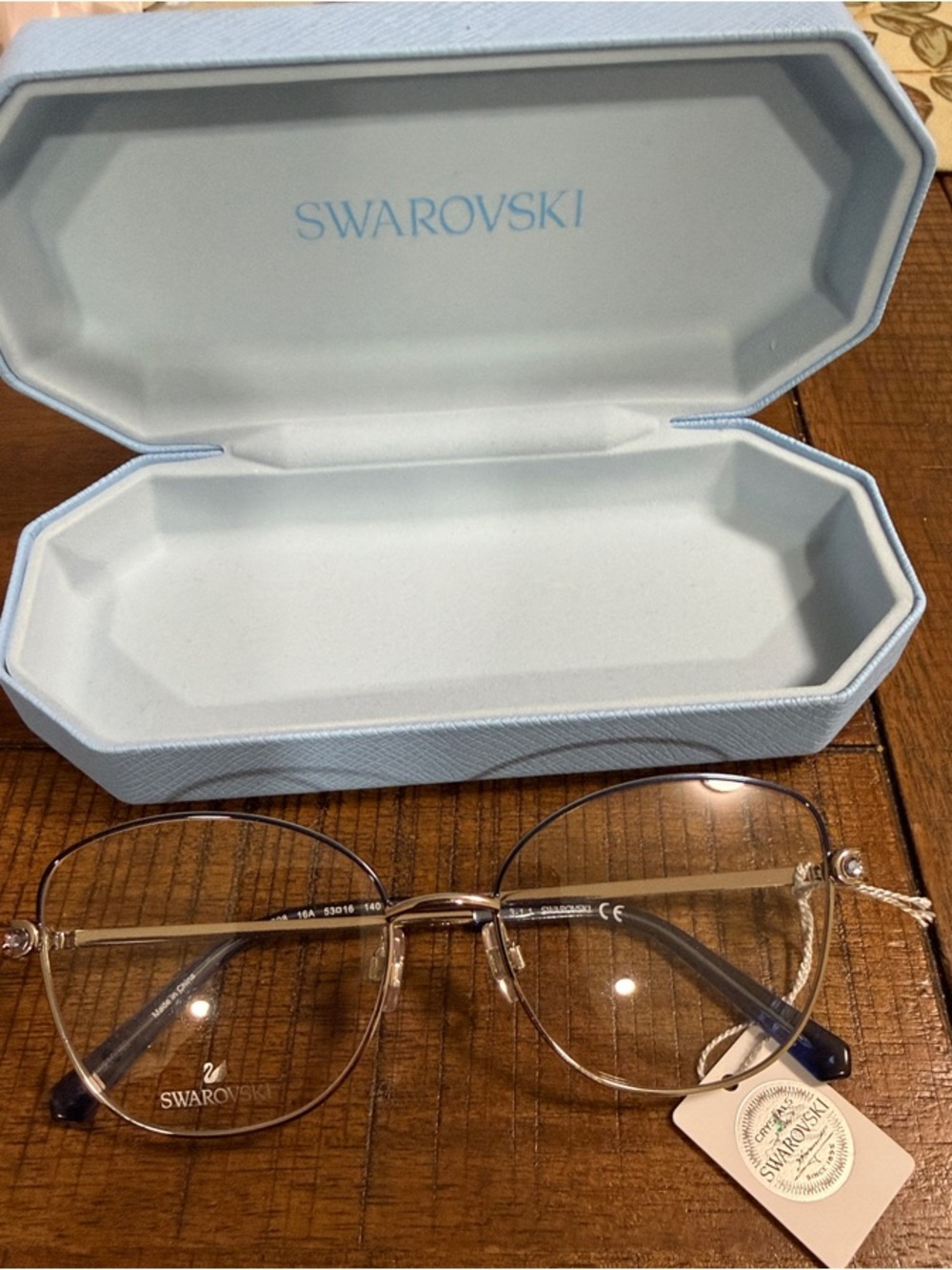 Swarovski Light Blue and Gold Rim Glasses with Case